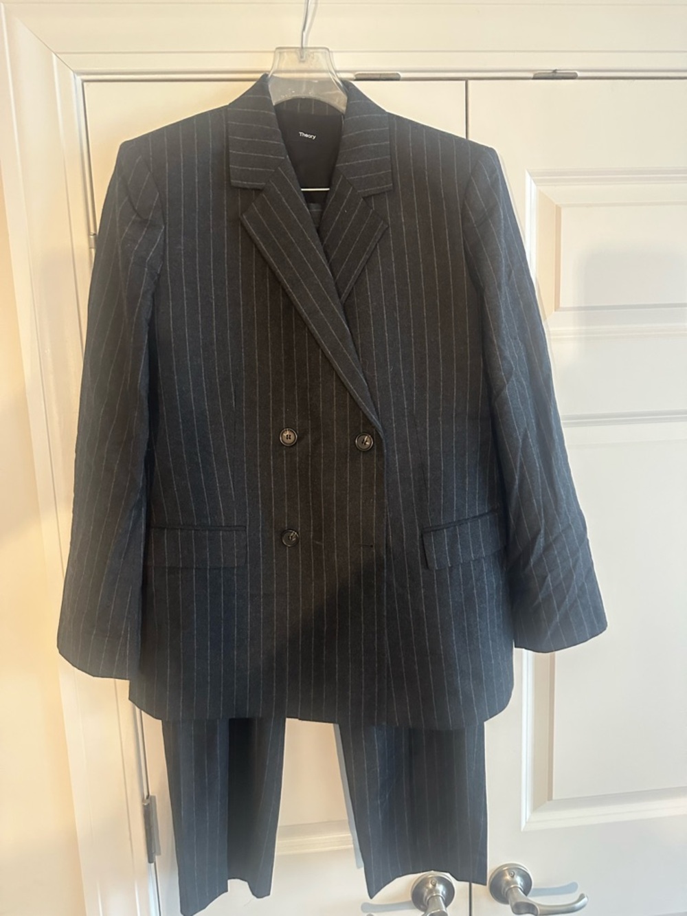 Theory ladies Charcoal grey flannel wool pinstripe suit.  
Size 10